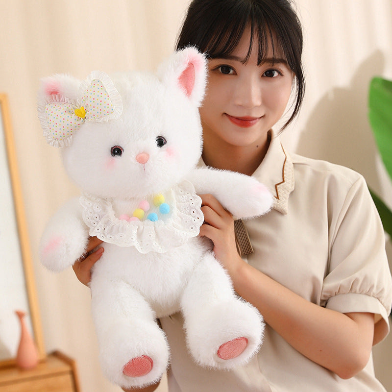 Adorable peluche chat blanc avec noeud