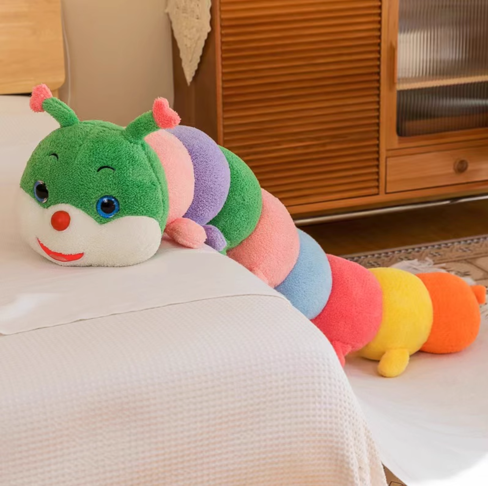 Cuddly top caterpillar toy